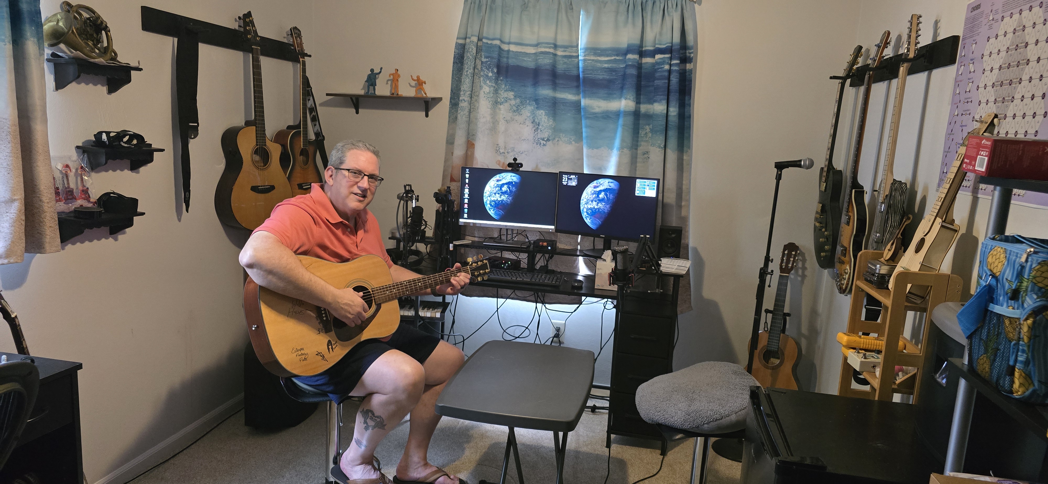 Rob welcoming a visitor into the 4½ Inch STUDio, with an empty guest chair waiting